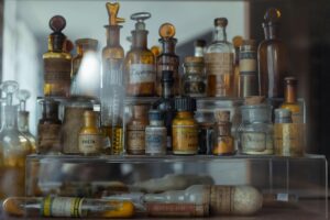 Historic alchemy bottles and laboratory glassware
